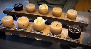 Two Cold Brew Flight boards of 10 different flavors at Loco Espress